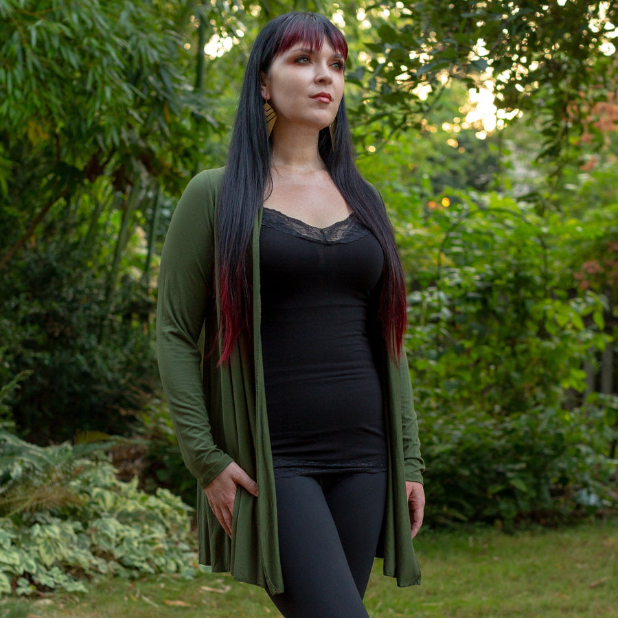 Model wearing long rayon cardigan in olive color
