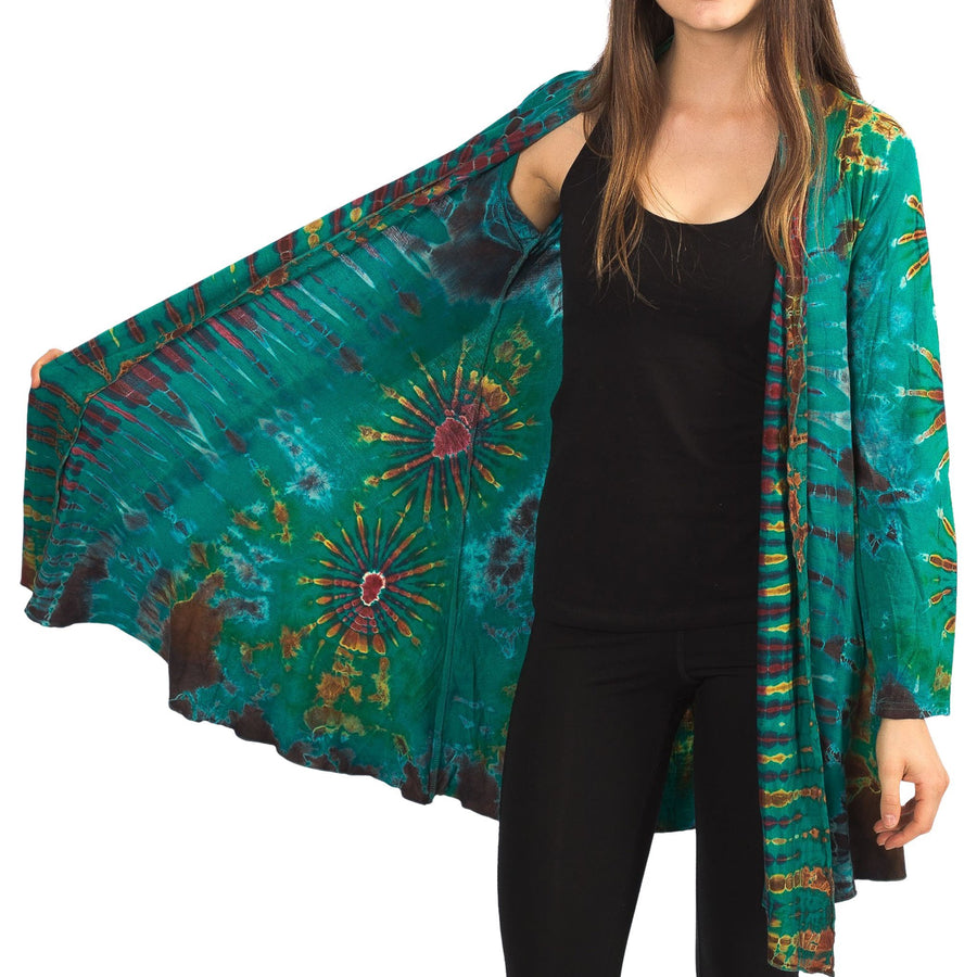 Model wearing Ocean Green Tie Dye Long Cardigan with stripes and starburst patterns in yellow, gold, orange and fuchsia